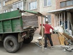 Фото №4 Вывоз строительного мусора с грузчиками