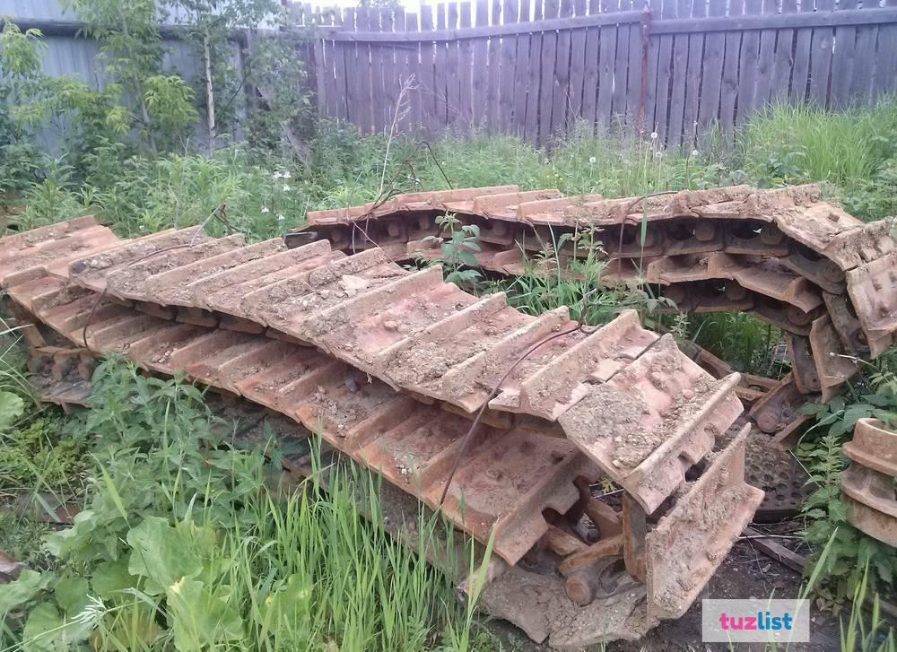 Сколько весит гусеница. Ведущий каток кв 1. Болотоходные гусеницы на дт 75. Гусеница трактора т 130. Гусеница тдт-55.