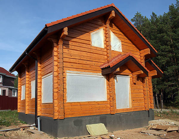 Фото Строительство деревянных домов из зимнего леса