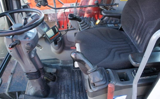 Фото Hitachi ZX130W-колесный экскаватор