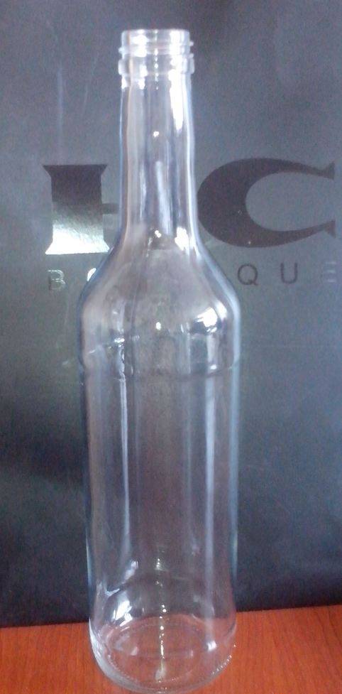 Фото Стеклянная бутылка под ликёроводочную продукцию