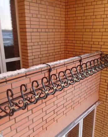 Фото Кованая цветочница на балкон