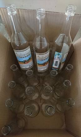 Фото Бутылки В-500 ГОСТ (28-В) 0,5 лт. в коробке с колпачками.