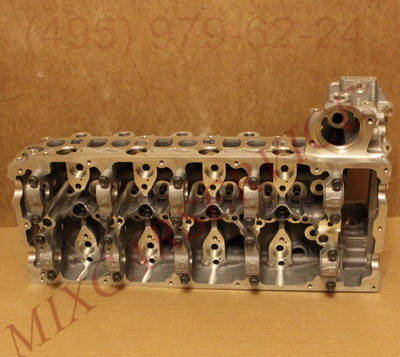 Фото Головка блока цилиндров на двигатель Isuzu 4JJ1 (8-97355-970