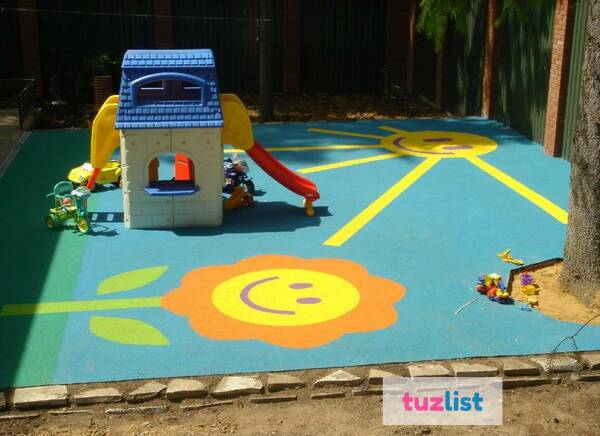 Фото Покрытия для детских площадок из яркого каучука