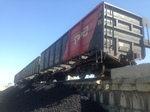 фото Выгрузка угля из вагона в Краснодаре. Хранение.